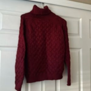 Rust turtle neck cable sweater by Venus size large